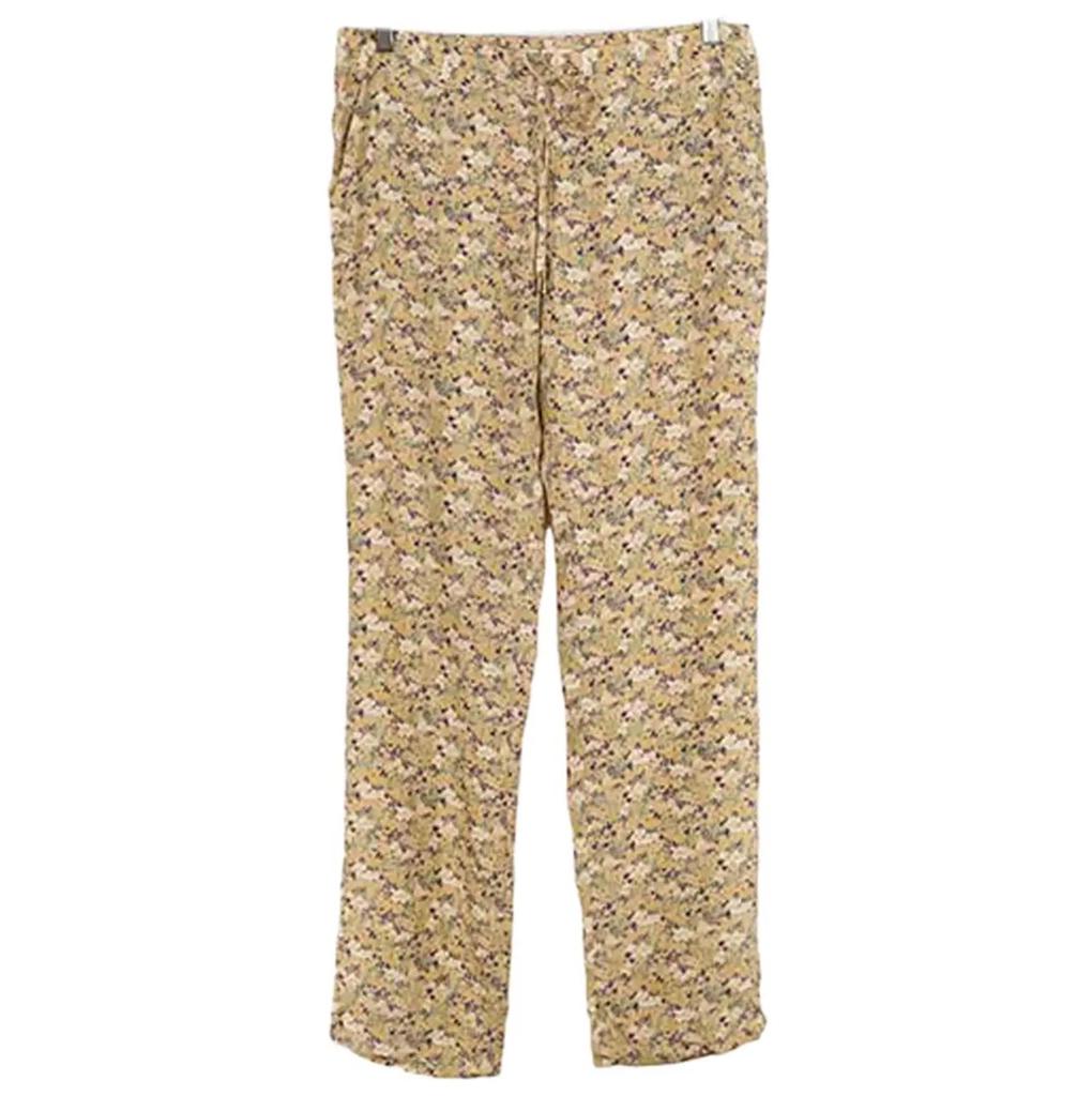 Pantalon femme ajusté motif floral beige